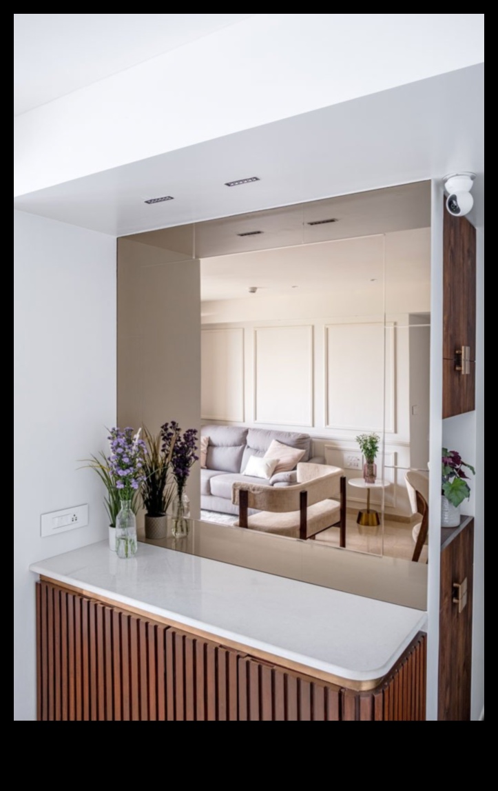 האם אתה יכול להציע דרכים יצירתיות להשתמש במראות בעיצוב הבית?